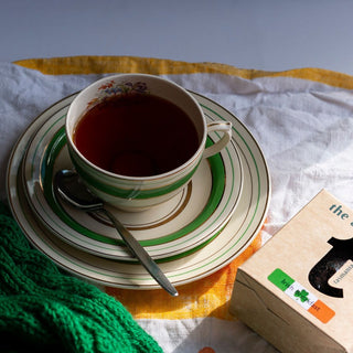 Irish Breakfast black tea with cup and box of tea