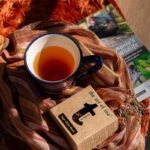 Sugar Glider Rooibos Fruit Blend with cup and box of tea