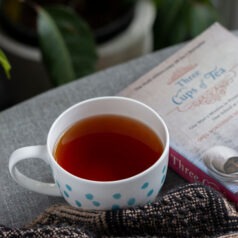 Yunnan tea with a cup and book